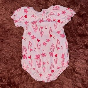 Carter’s onesie pink with red detail sz: 12 months button up back
